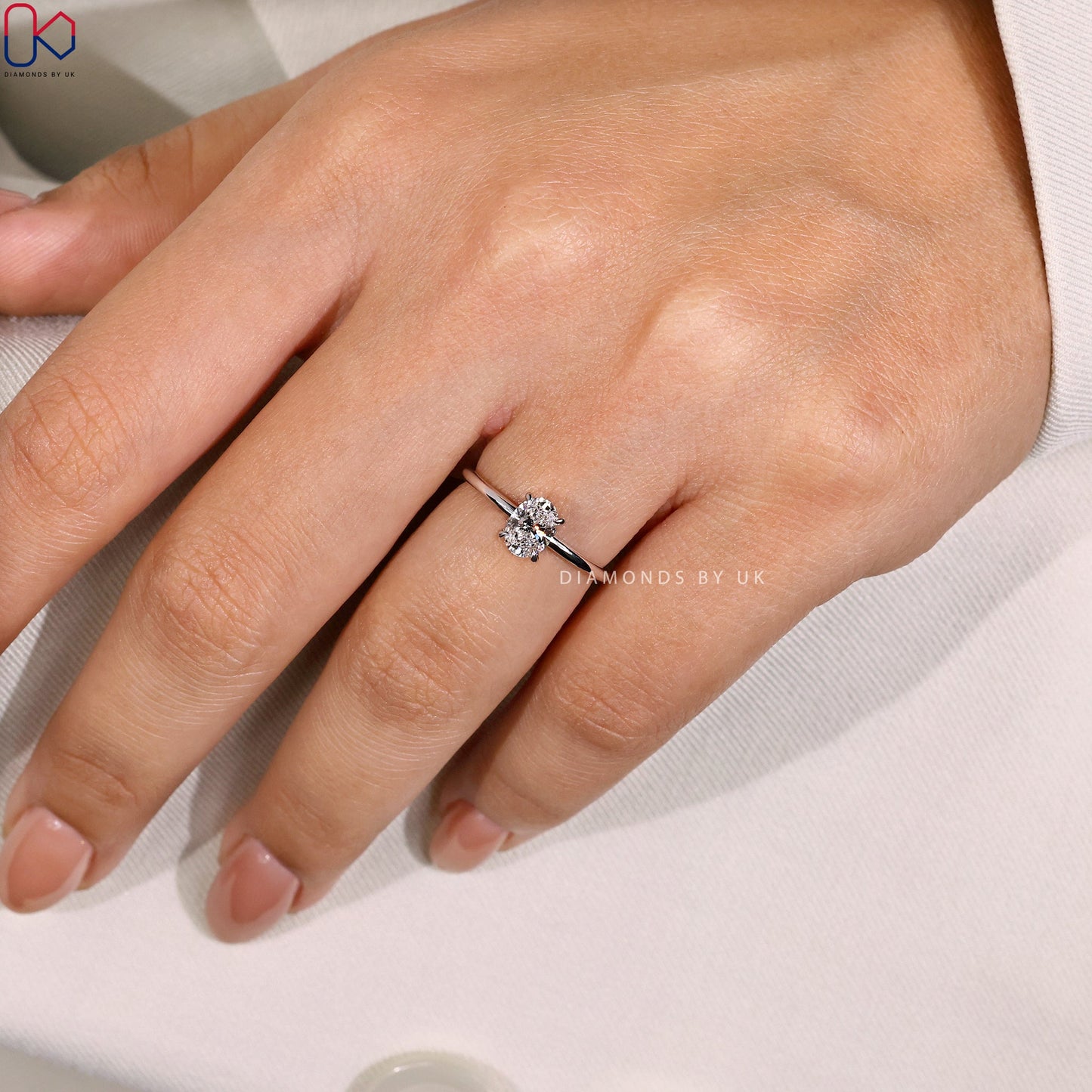 Oval Solitaire Engagement Ring In Prong Setting