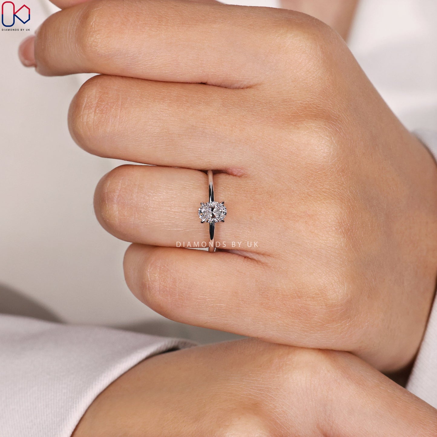 Oval Solitaire Engagement Ring In Prong Setting