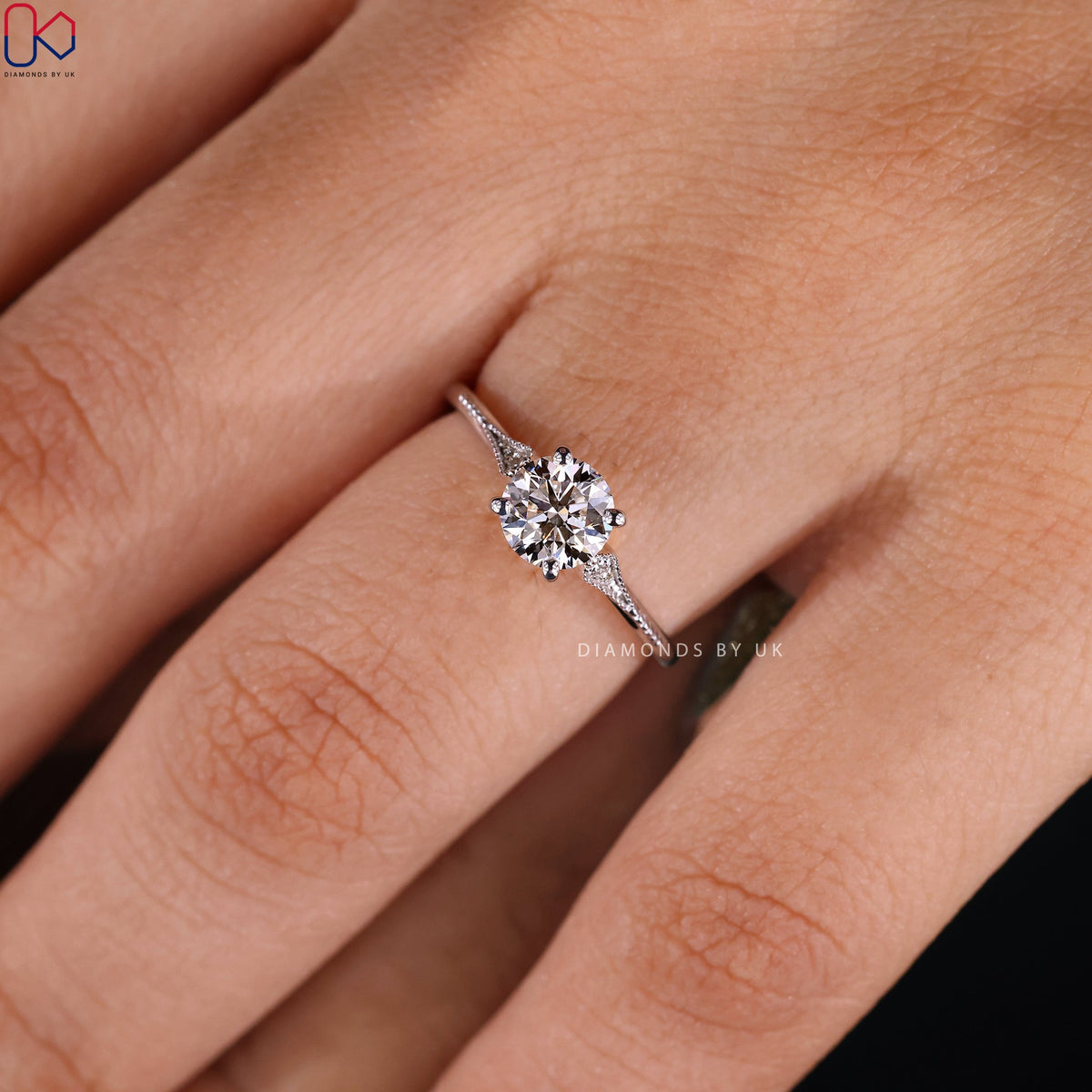 Round Diamond Side Stone Engagement Ring