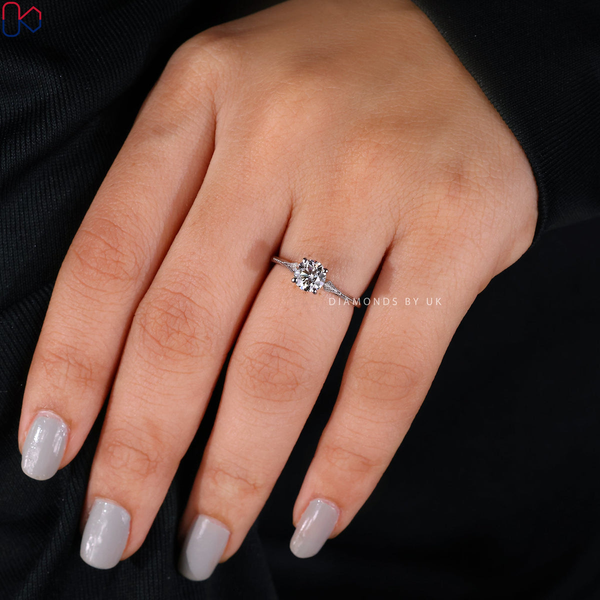 Round Diamond Side Stone Engagement Ring