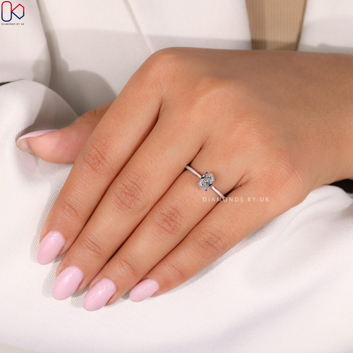 White Gold Oval Solitaire Engagement Ring
