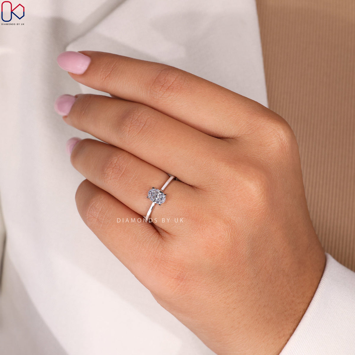 White Gold Oval Solitaire Engagement Ring