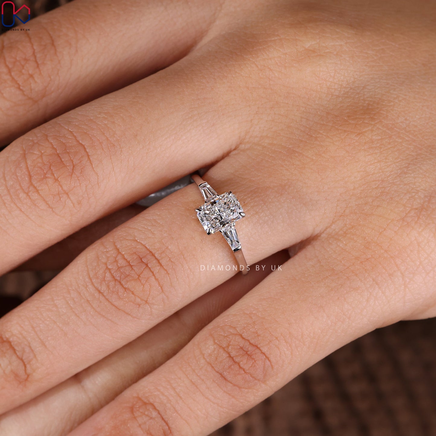 Radiant Cut Diamond Ring With Tapered Baguette Side Stone