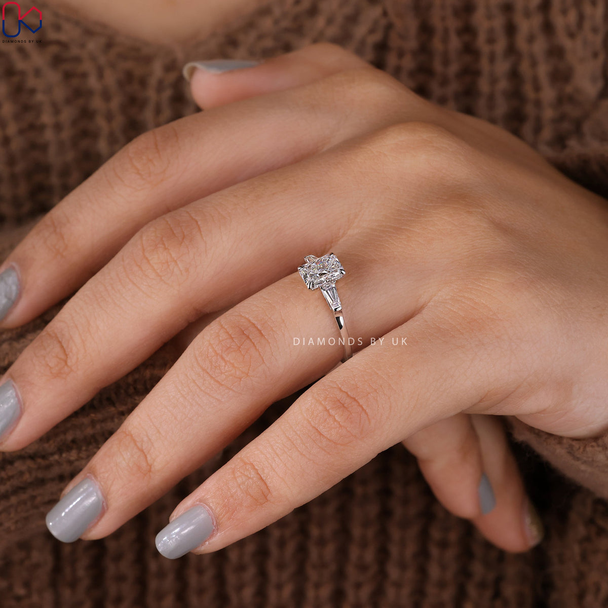 Radiant Cut Diamond Ring With Tapered Baguette Side Stone