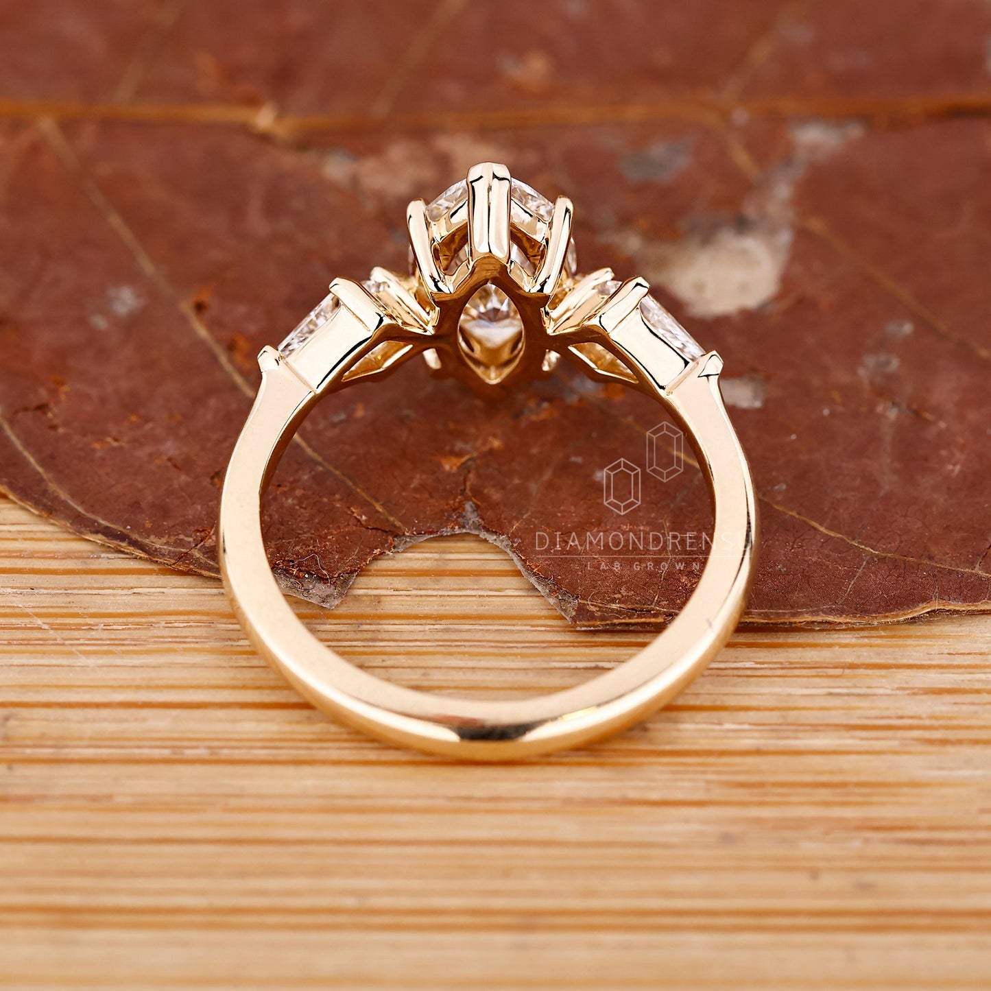 Marquise and Kite Cut Three Stone Engagement Ring