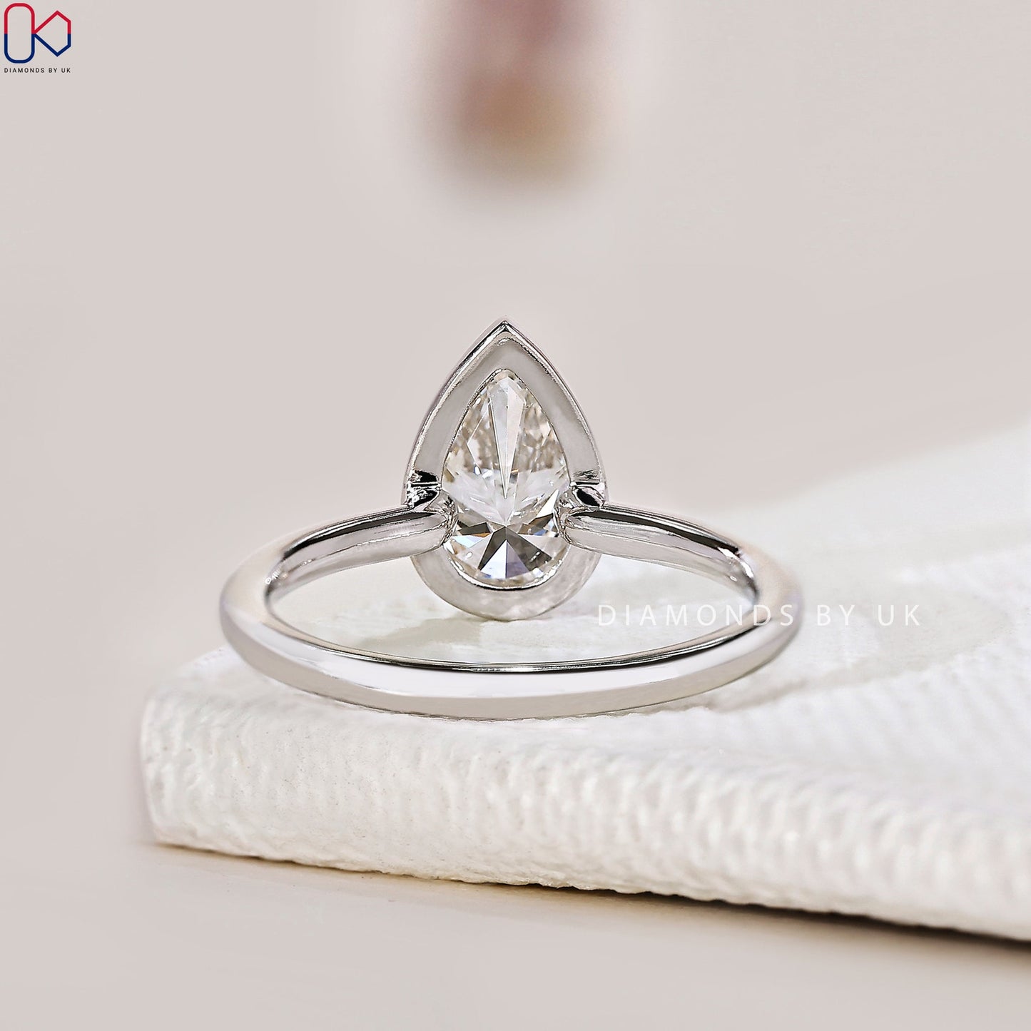 Bezel Setting Pear Cut Diamond Engagement Ring