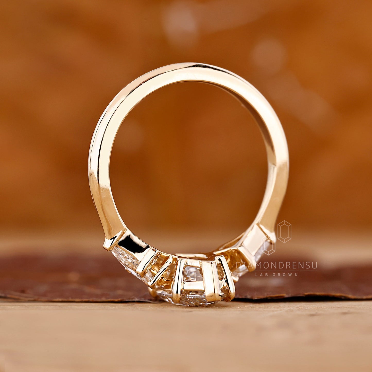 Marquise and Kite Cut Three Stone Engagement Ring