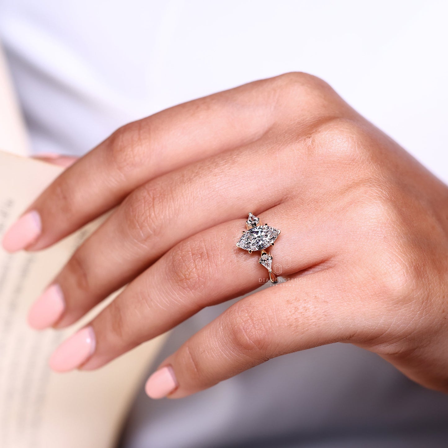 Marquise and Kite Cut Three Stone Engagement Ring