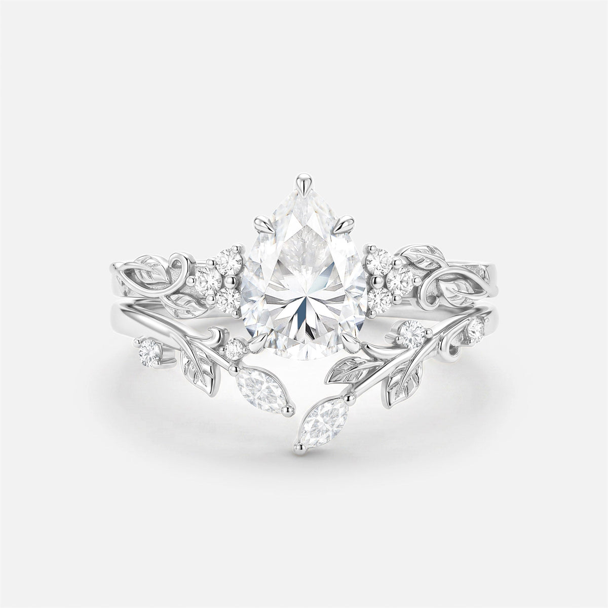 Luminous Reverie - Pear Cut Blue Moissanite Leaf Dainty Engagement Ring Sets - Stella