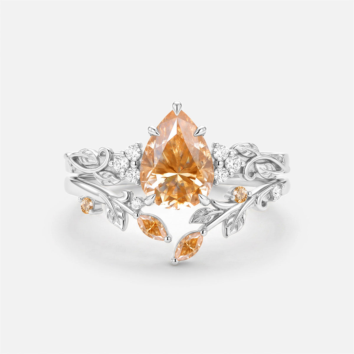 Luminous Reverie - Pear Cut Blue Moissanite Leaf Dainty Engagement Ring Sets - Stella