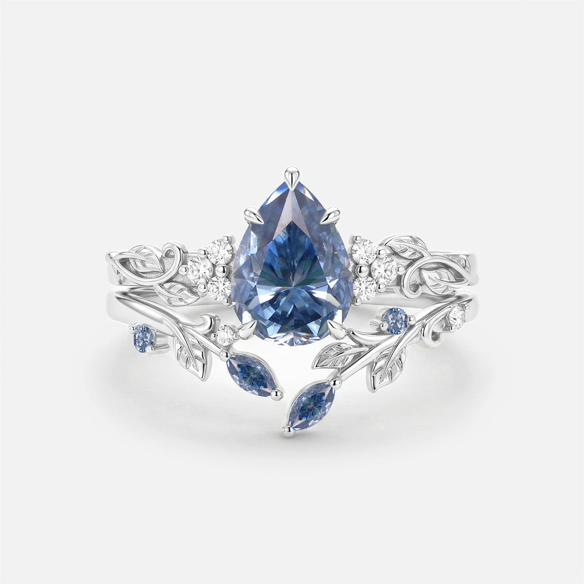 Luminous Reverie - Pear Cut Blue Moissanite Leaf Dainty Engagement Ring Sets - Stella