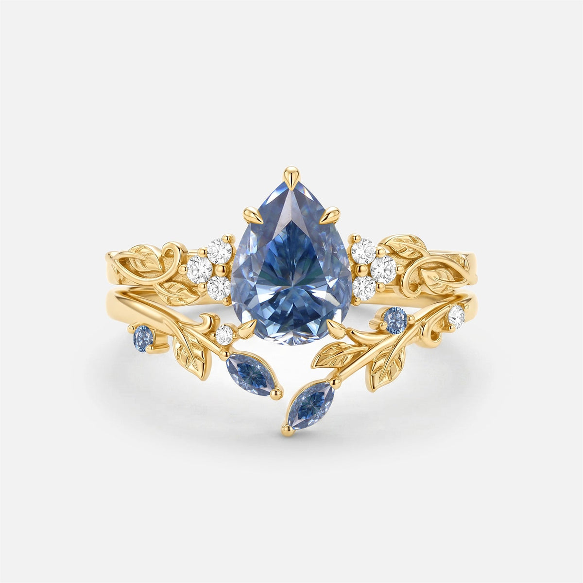 Luminous Reverie - Pear Cut Blue Moissanite Leaf Dainty Engagement Ring Sets - Stella