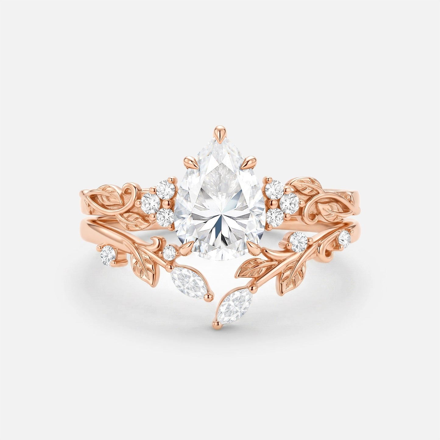 Luminous Reverie - Pear Cut Blue Moissanite Leaf Dainty Engagement Ring Sets - Stella