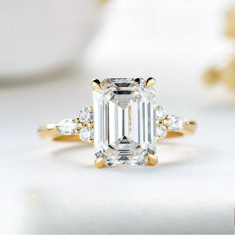 Daity Emerald Cut Three Stone Sterling Silver Bridal Set