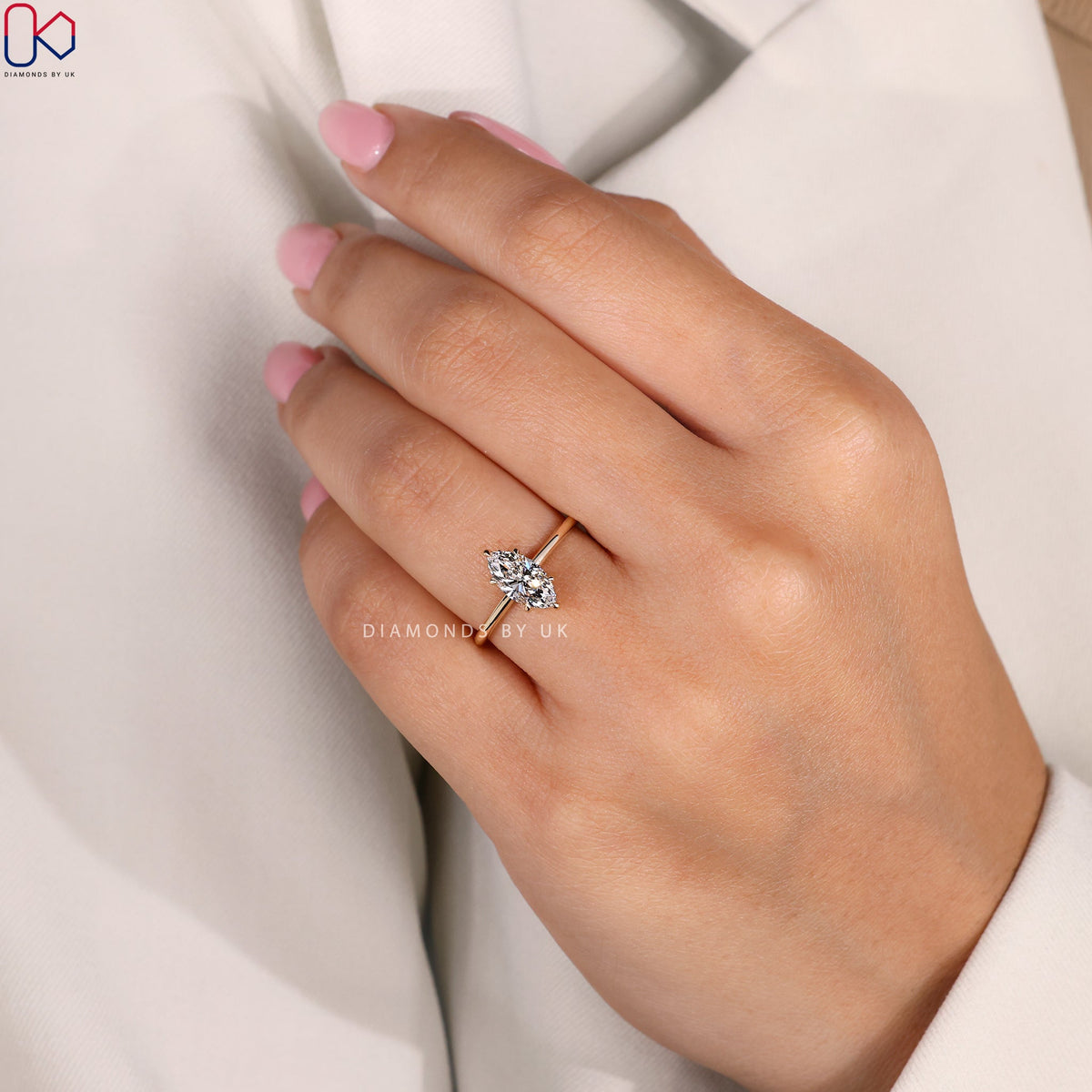 Marquise Cut Diamond Ring In Hidden Halo Setting