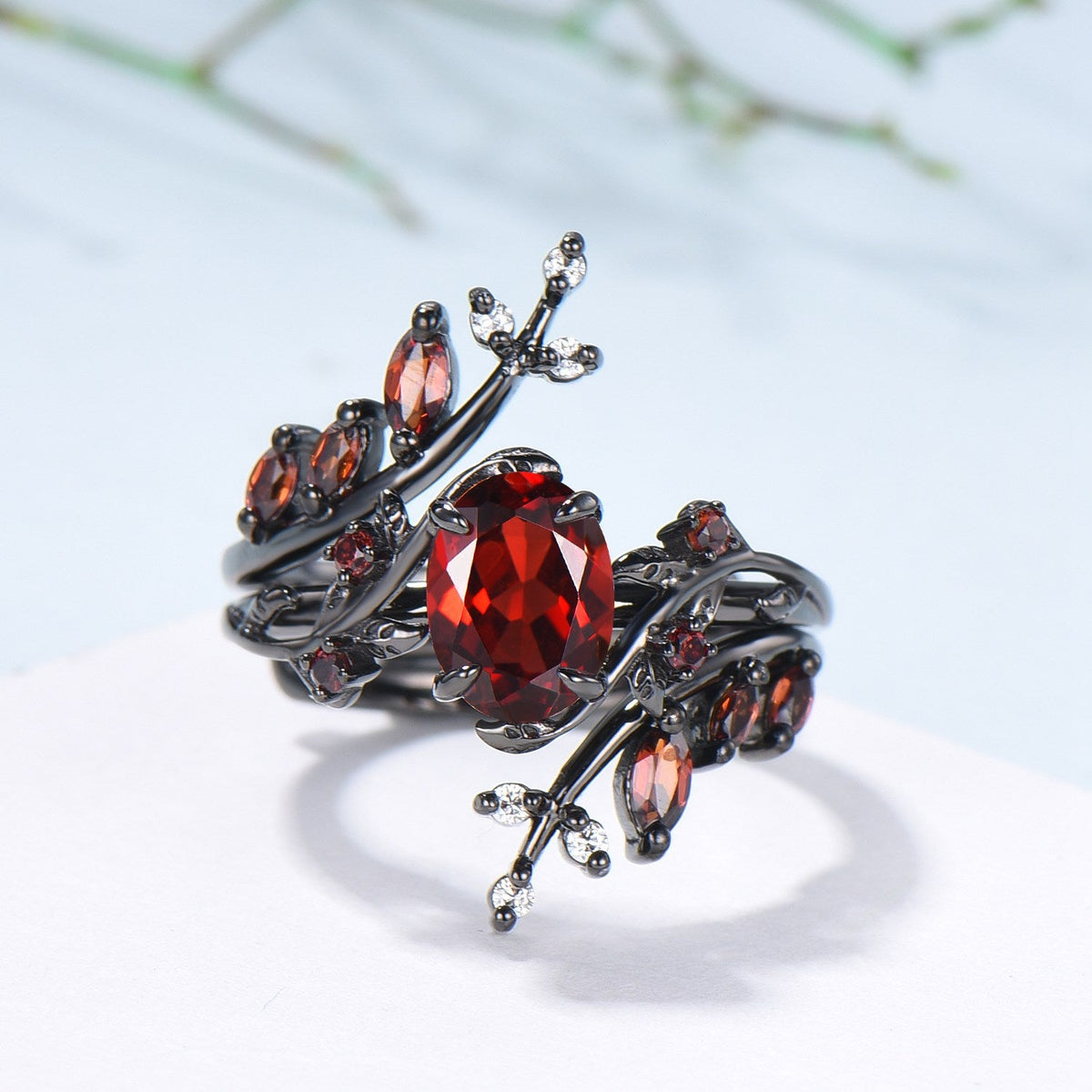 Nature inspired oval garnet engagement ring set black gold unique leaf gothic wedding ring set knight twig vine January birthstone jewelry