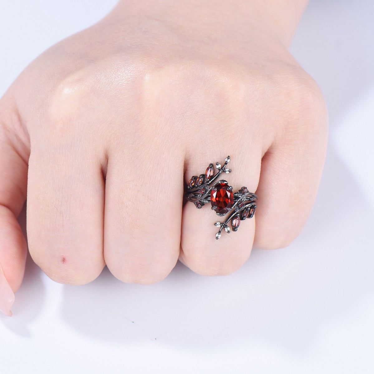 Nature inspired oval garnet engagement ring set black gold unique leaf gothic wedding ring set knight twig vine January birthstone jewelry