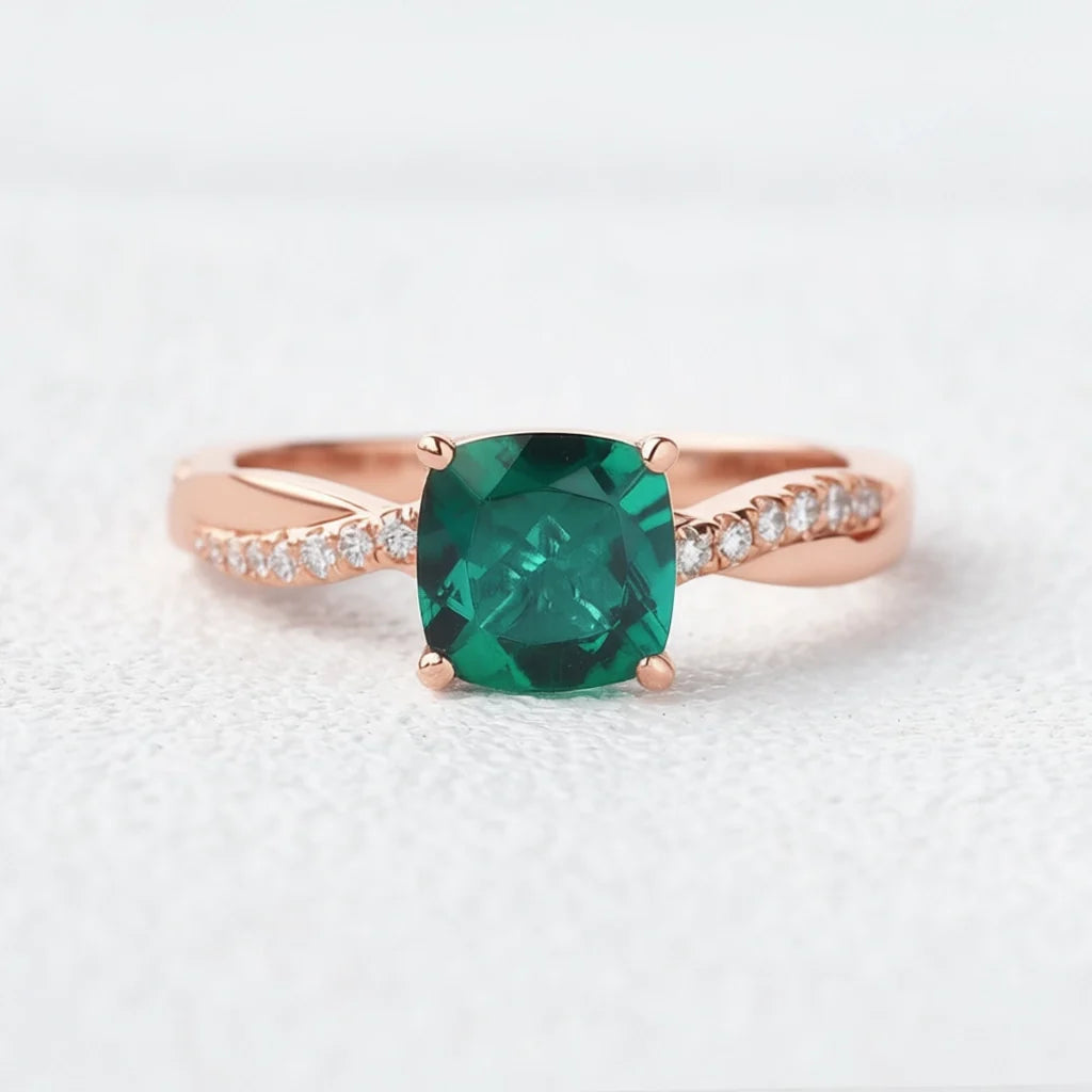 Ivy’s Twist | 2CT Cushion Cut Emerald Solitaire Engagement Ring