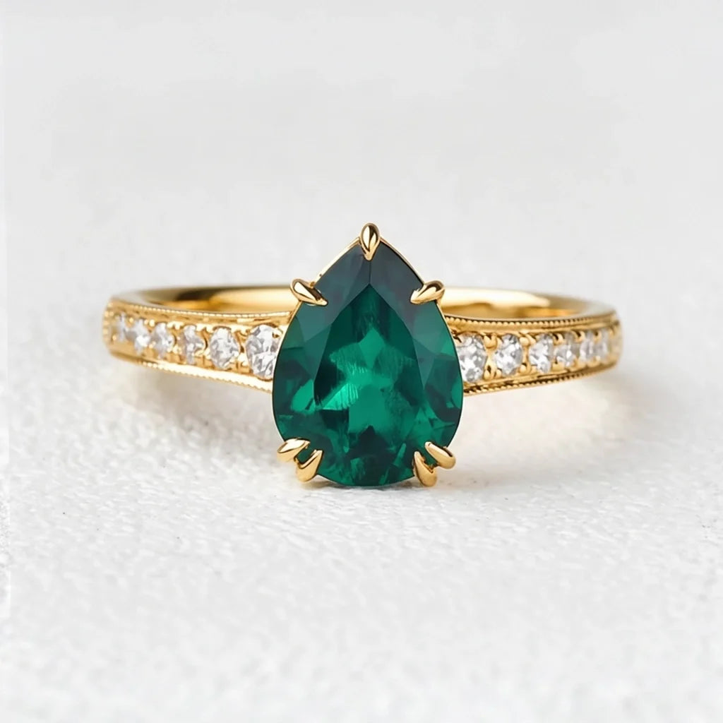 Olive’s Whisper | 1.5CT Classic Pear Cut Lab Emerald Engagement Ring