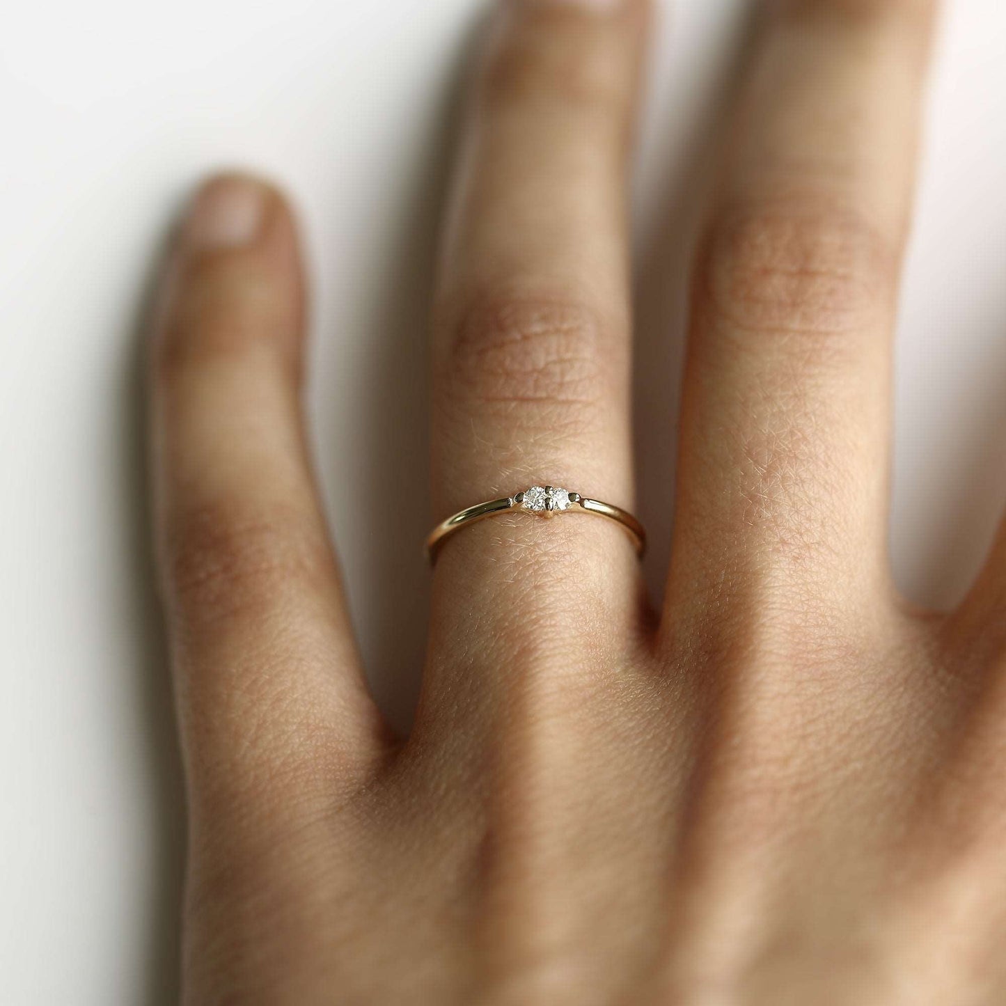 PAIRED WHITE DIAMOND RING