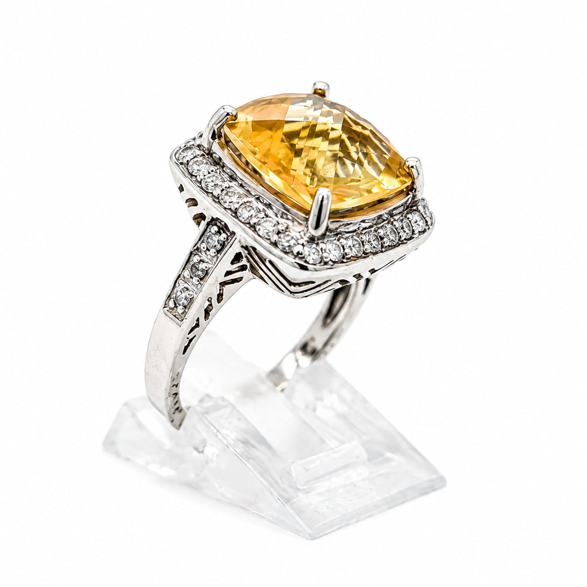 SS Ring with facated orange-yellow stone