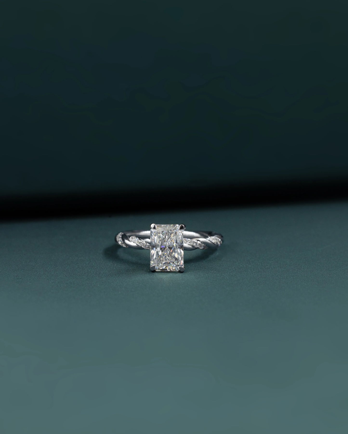2.16 CTW Emerald Cut Lab-Grown Diamond Twisted Pave Solitaire Ring