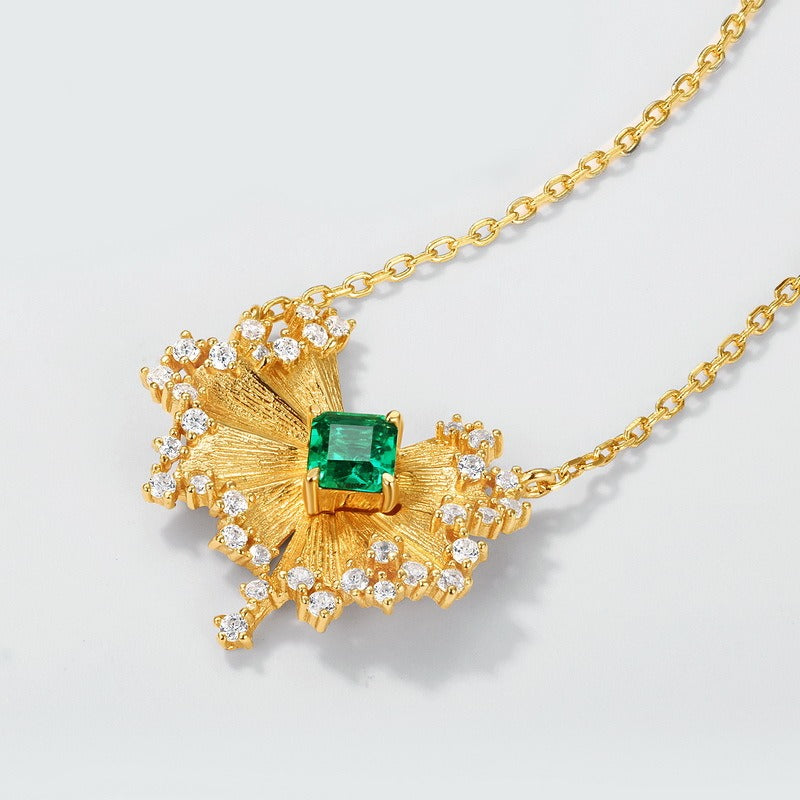 Vintage Inspired Gold Sunburst Necklace with Emerald Green Gem and Crystal Halo
