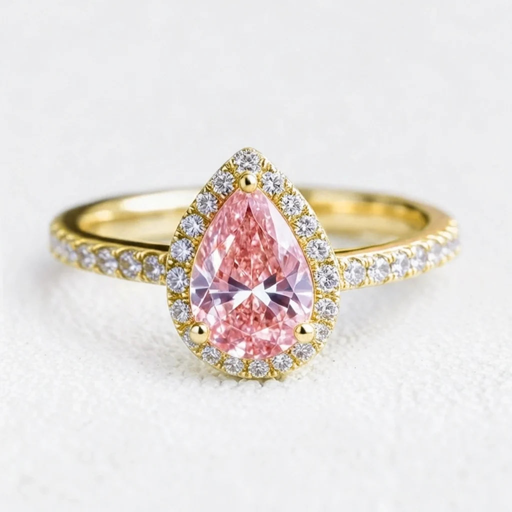 Stella’s Spark | 3CT Pear Cut Pink Sapphire Engagement Ring