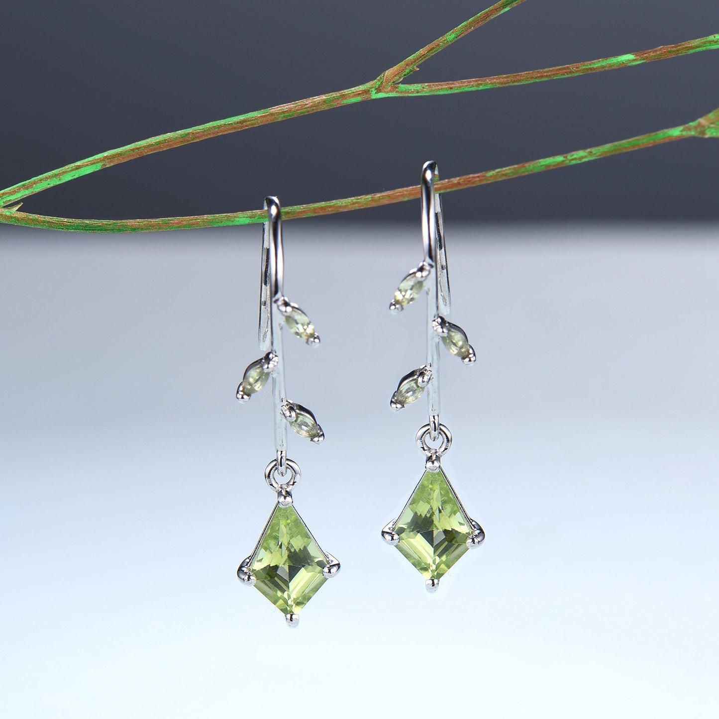 Vintage kite peridot earrings Unique pinwheel earrings marquise peridot drop stud earrings