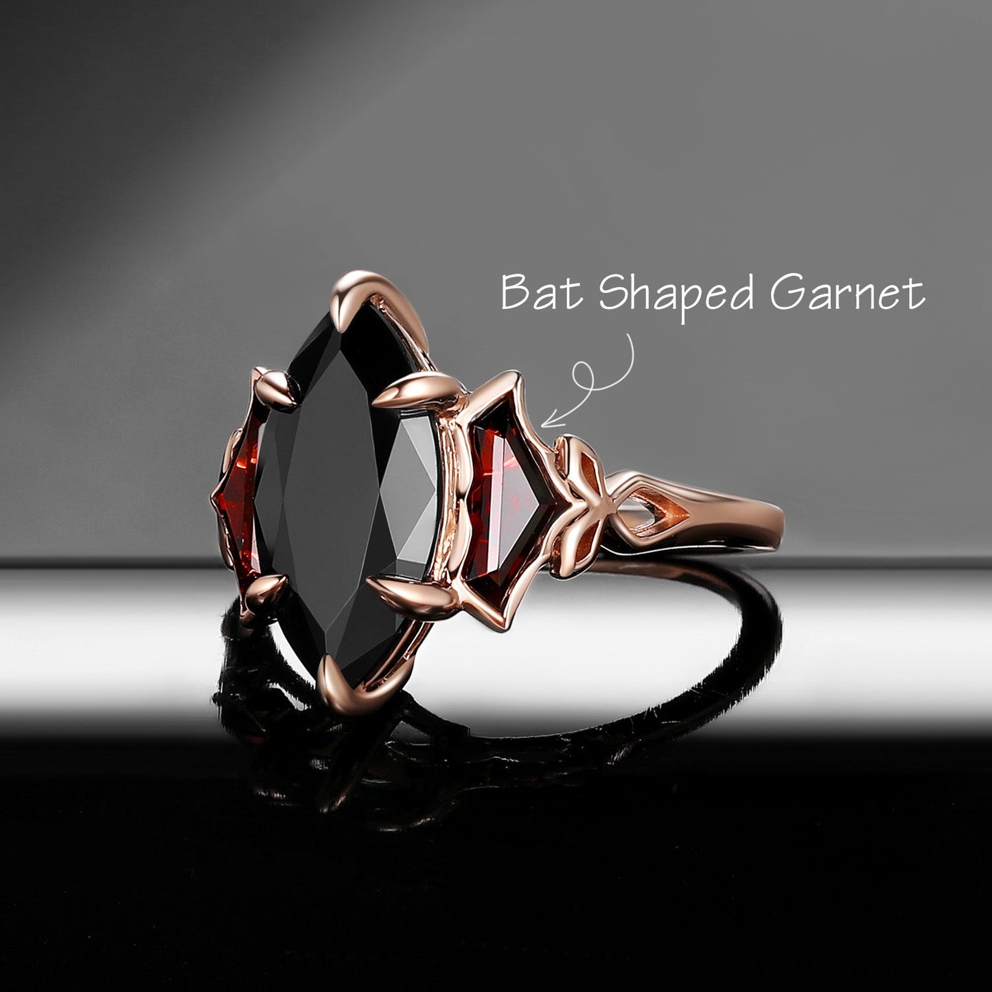 'The Winged Guardian' - Gothic Marquise Cut Black Moissanite Engagement Ring with Bat Wing Shaped Accent Stones