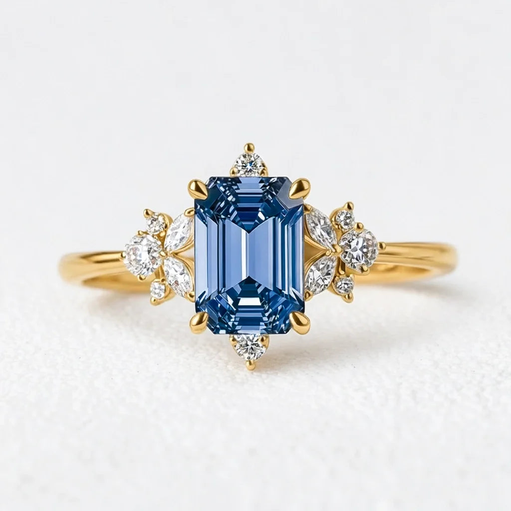 Lyra’s Cadence | 2CT Vintage Emerald Cut Blue Sapphire Ring