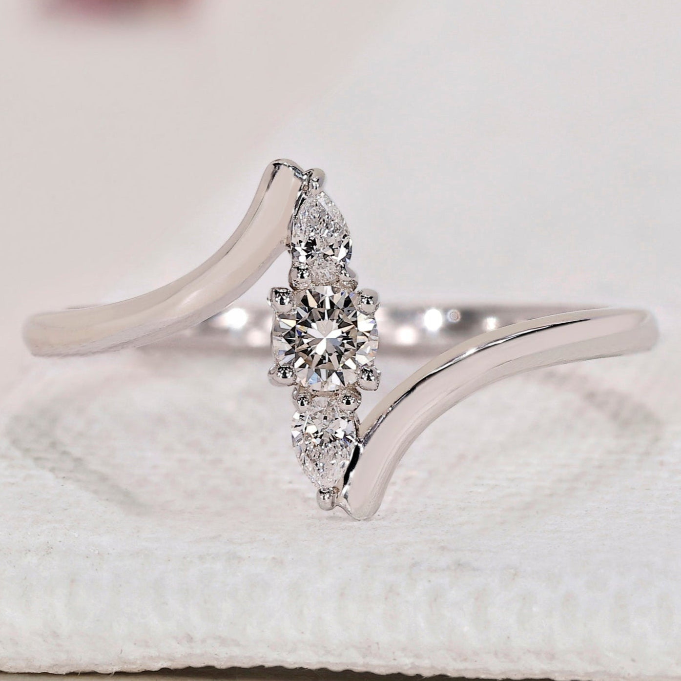 Round and Pear 3 Stone Diamond Ring