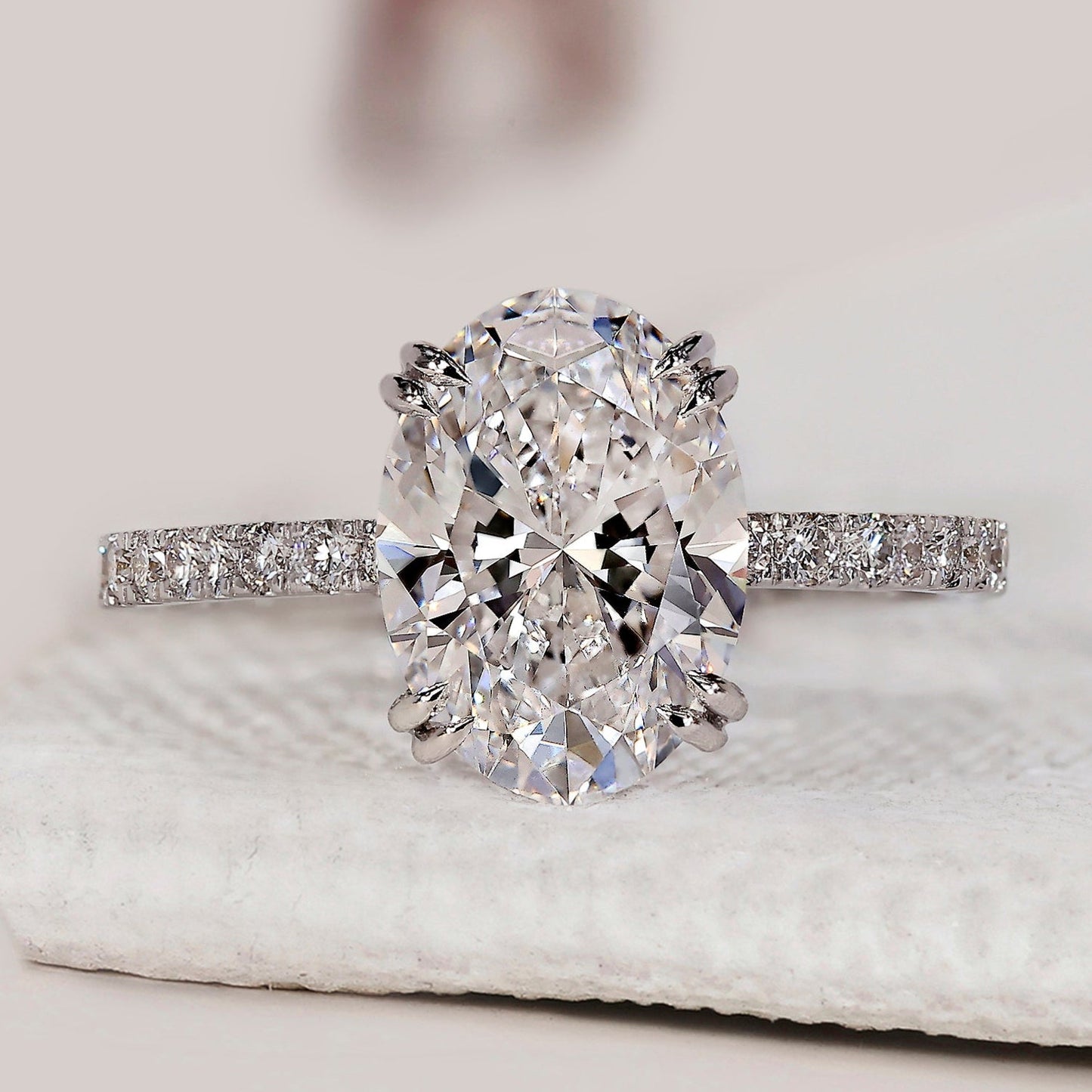 Oval Cut Diamond Ring In Pave Setting