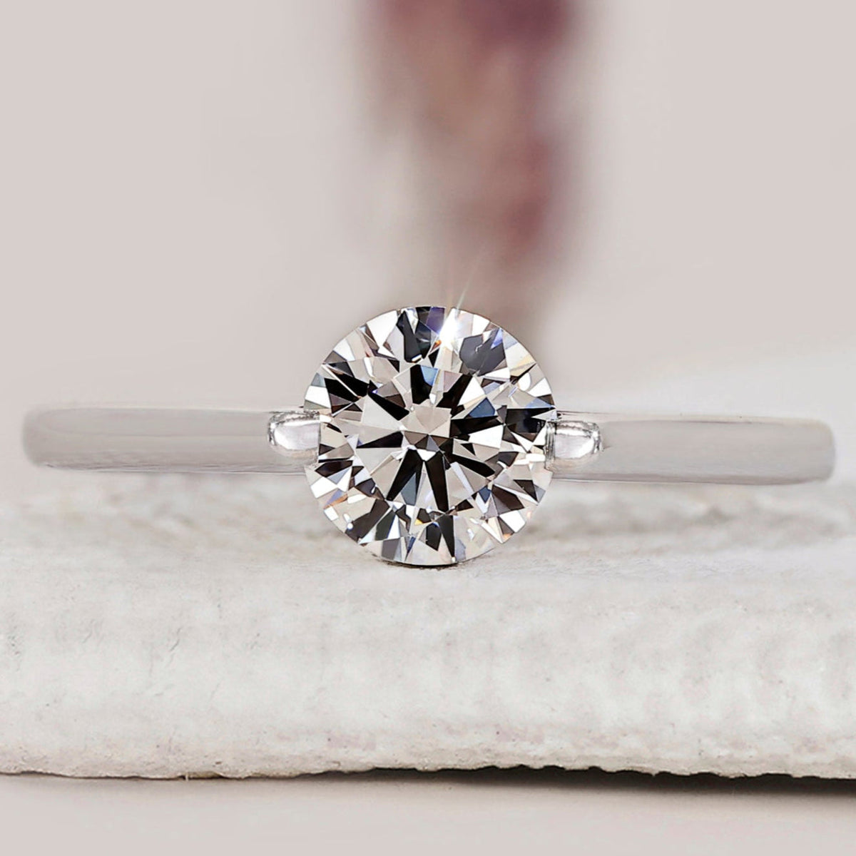 Round Solitaire Engagement Ring In White Gold