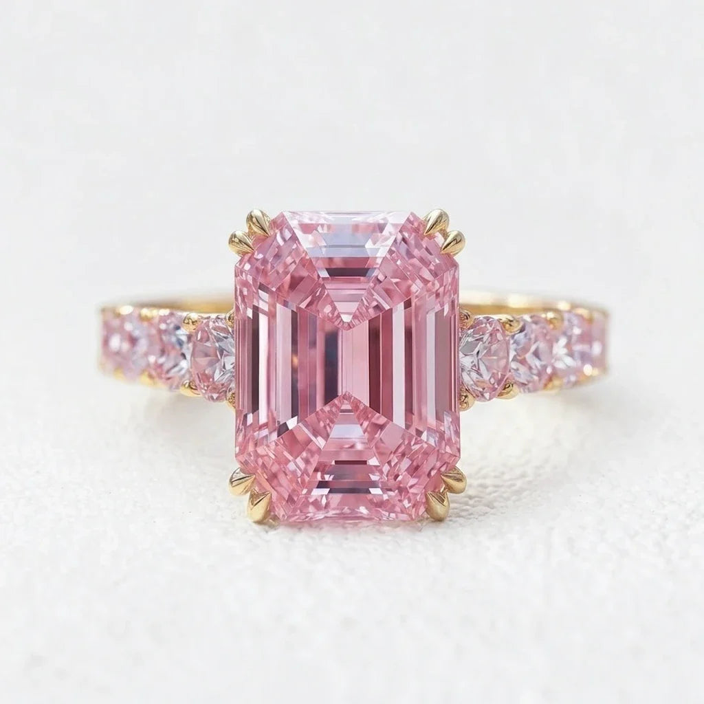 Aurora’s Aureole | 3CT Emerald Cut Pink Sapphire Engagement Ring