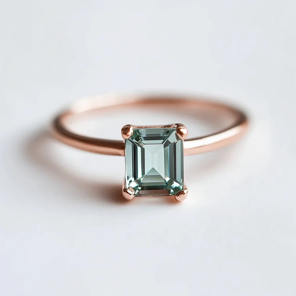 Gaia’s Solace | Emerald Cut Green Tourmaline Solitaire Engagement Ring