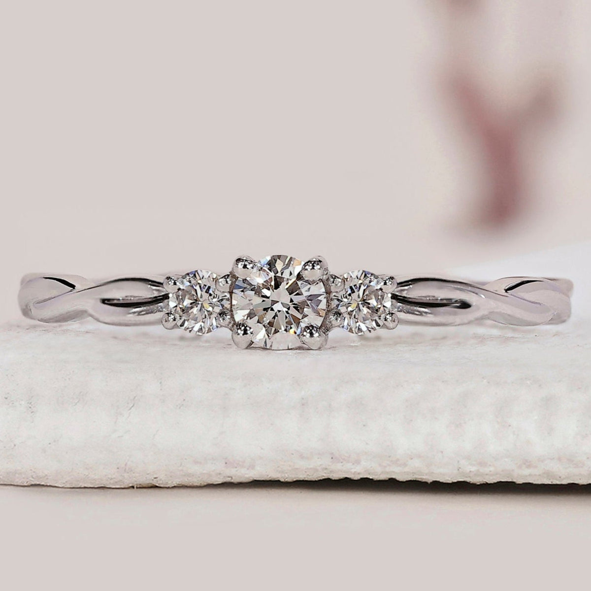 3 Stone Round Diamond Ring With Twist Shank