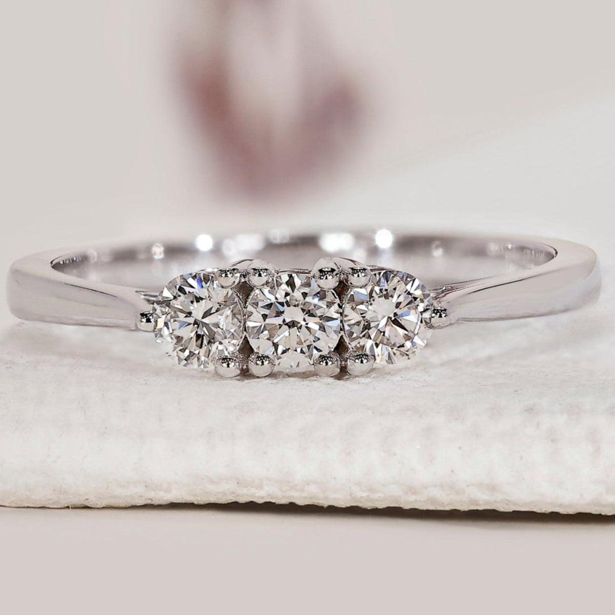 Round Diamond 3 Stone Band In White Gold
