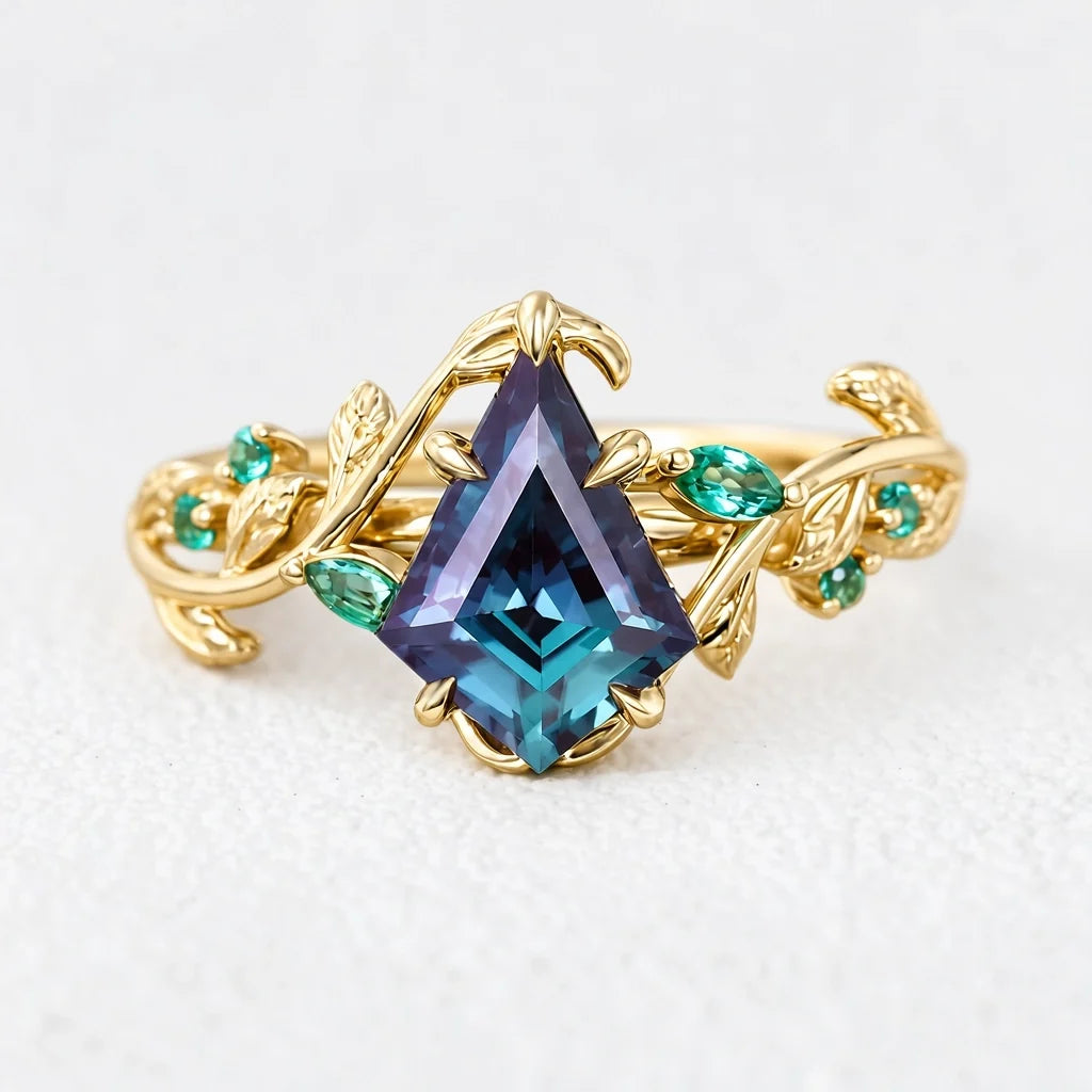 Celestine’s Mirage | Kite Alexandrite with Emerald Foliage Engagement Ring