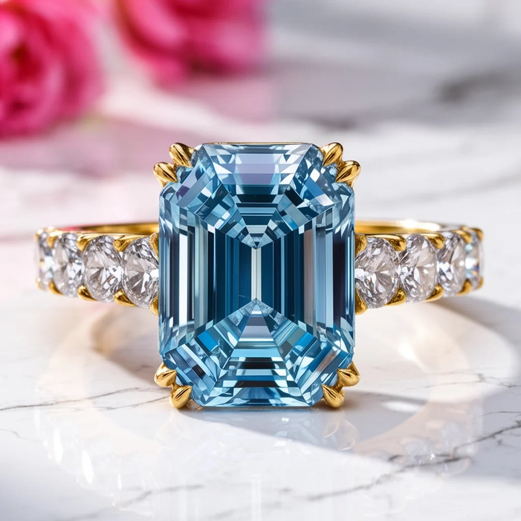 Marina’s Epoch | 3CT Emerald Cut Blue Sapphire Solitaire Engagement Ring