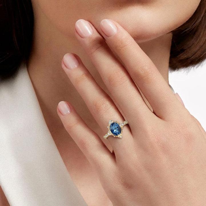 Aurelia’s Luminara | 1.5CT Oval London Blue Topaz & Diamond Art Deco Ring
