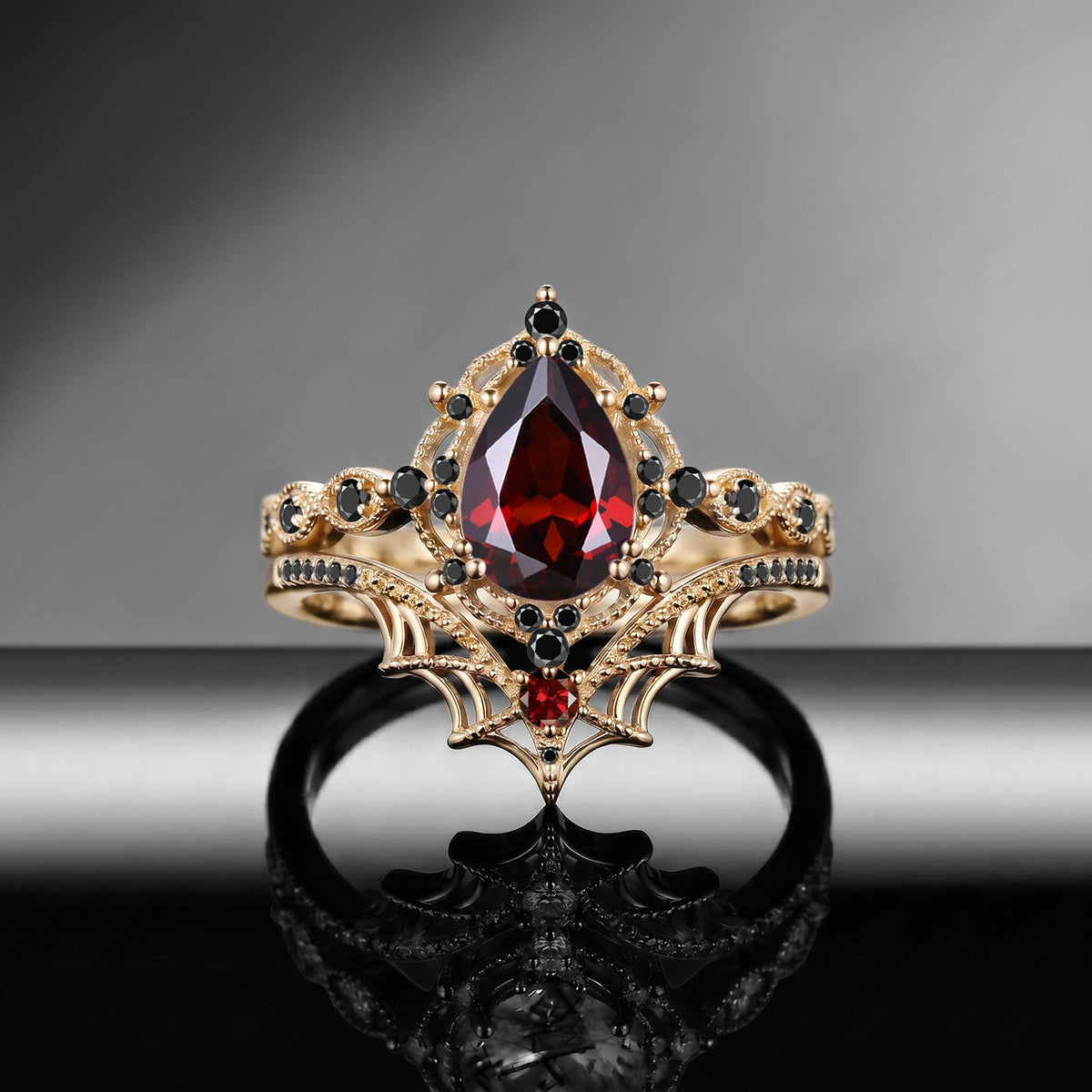 Spider Ring 'Web of Love' – Gothic Pear Cut Garnet Engagement Ring Set with Spider Web Inspired Milgrain Band