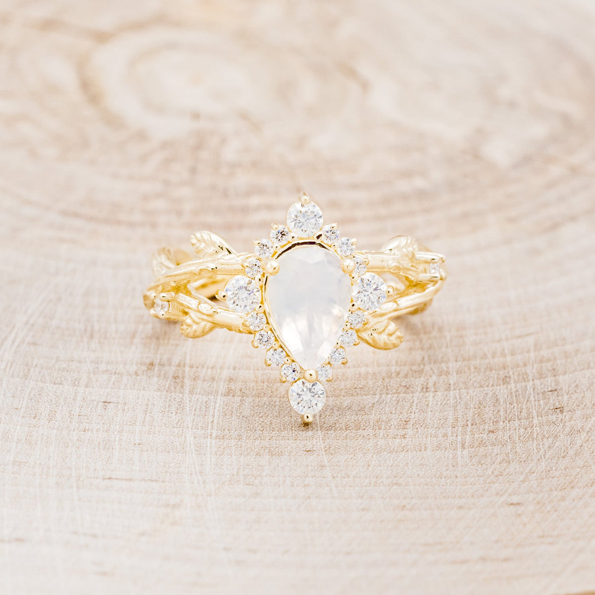 "Artemis On The Vine Divine" - Moonstone Engagement Ring With Diamond Accents & A Branch-Style Band