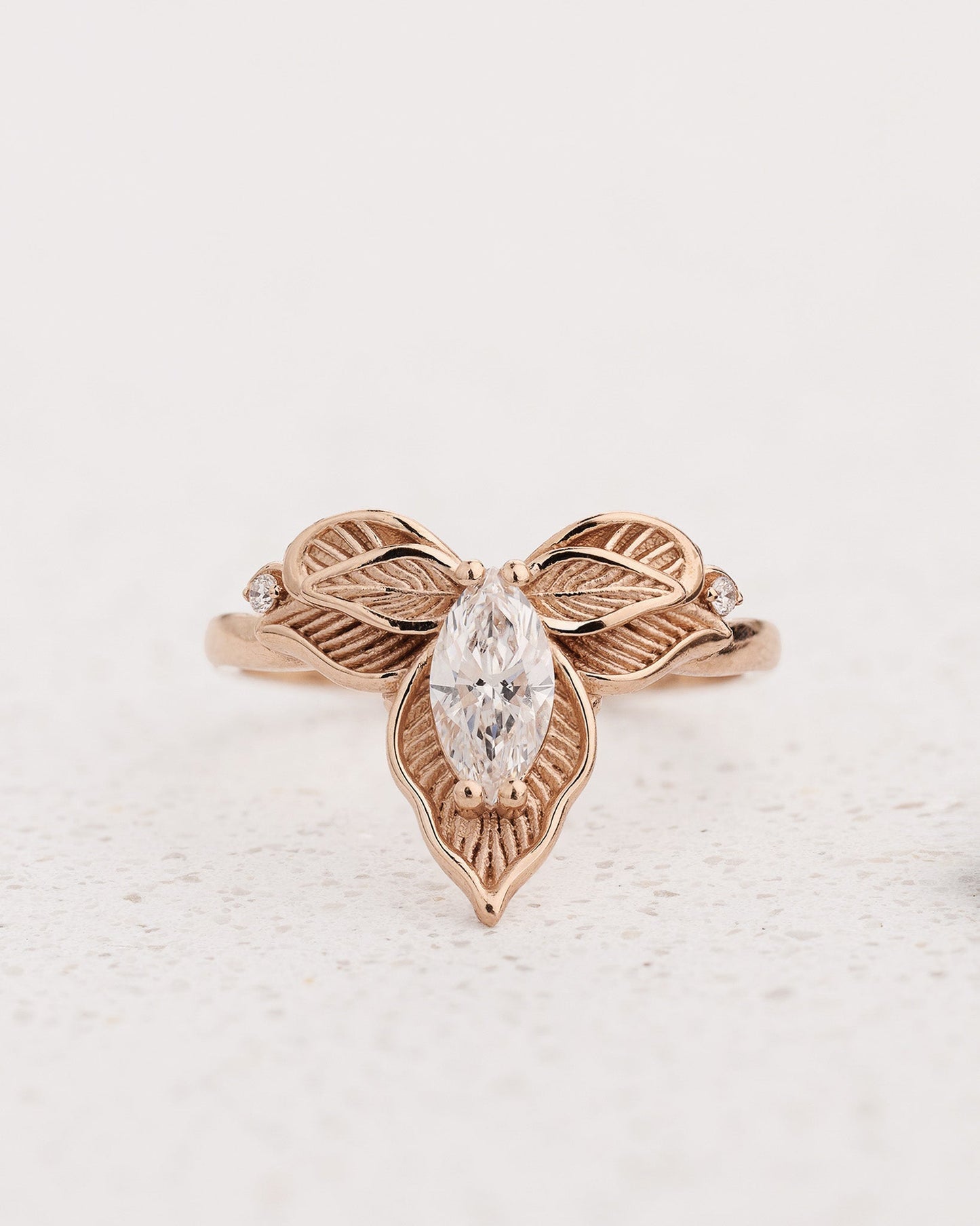 Orchid flower ring set with marquise diamond