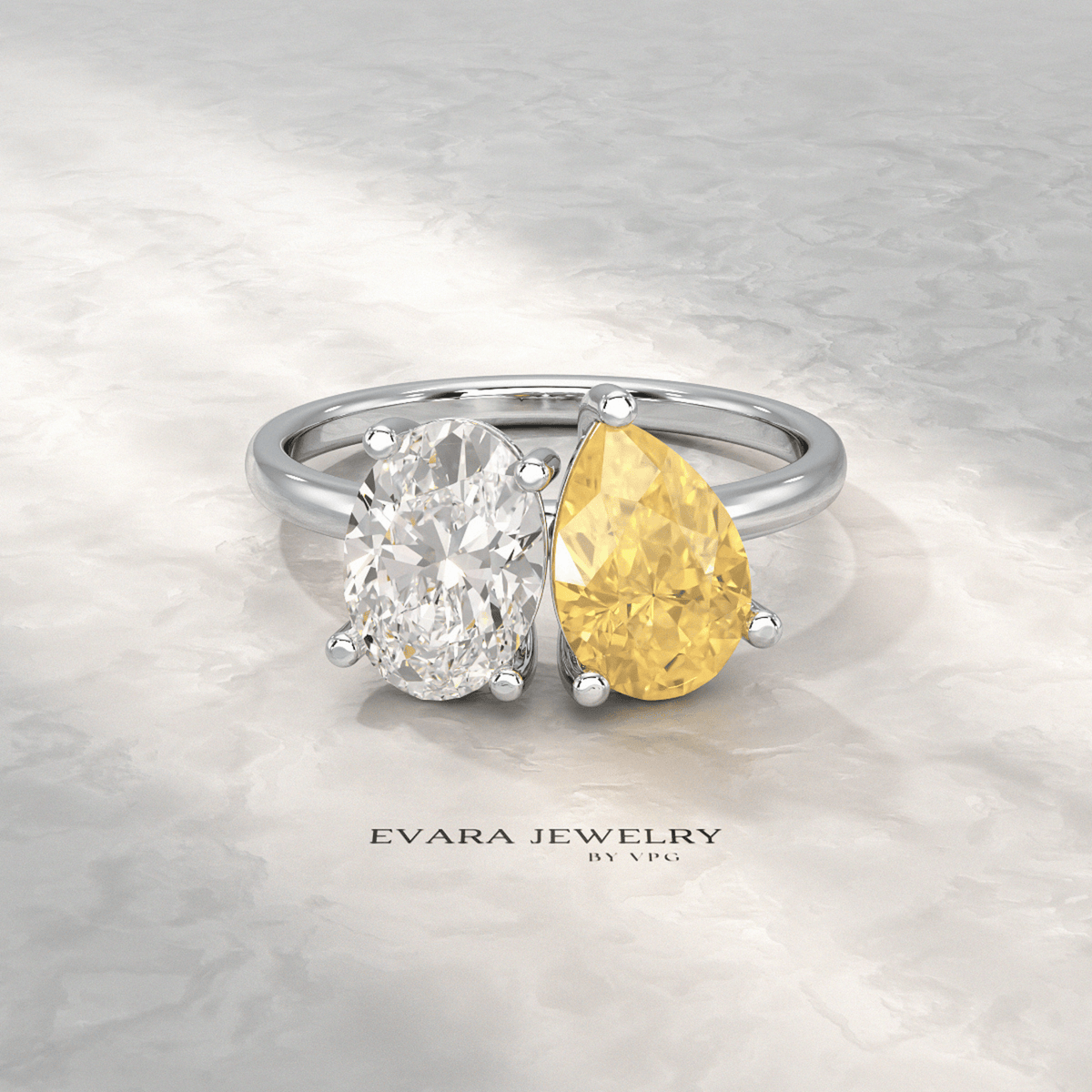 2.25 Carat Oval Diamond & Pear Cut Intense Yellow Diamond Toi Et Moi Two Stone Ring