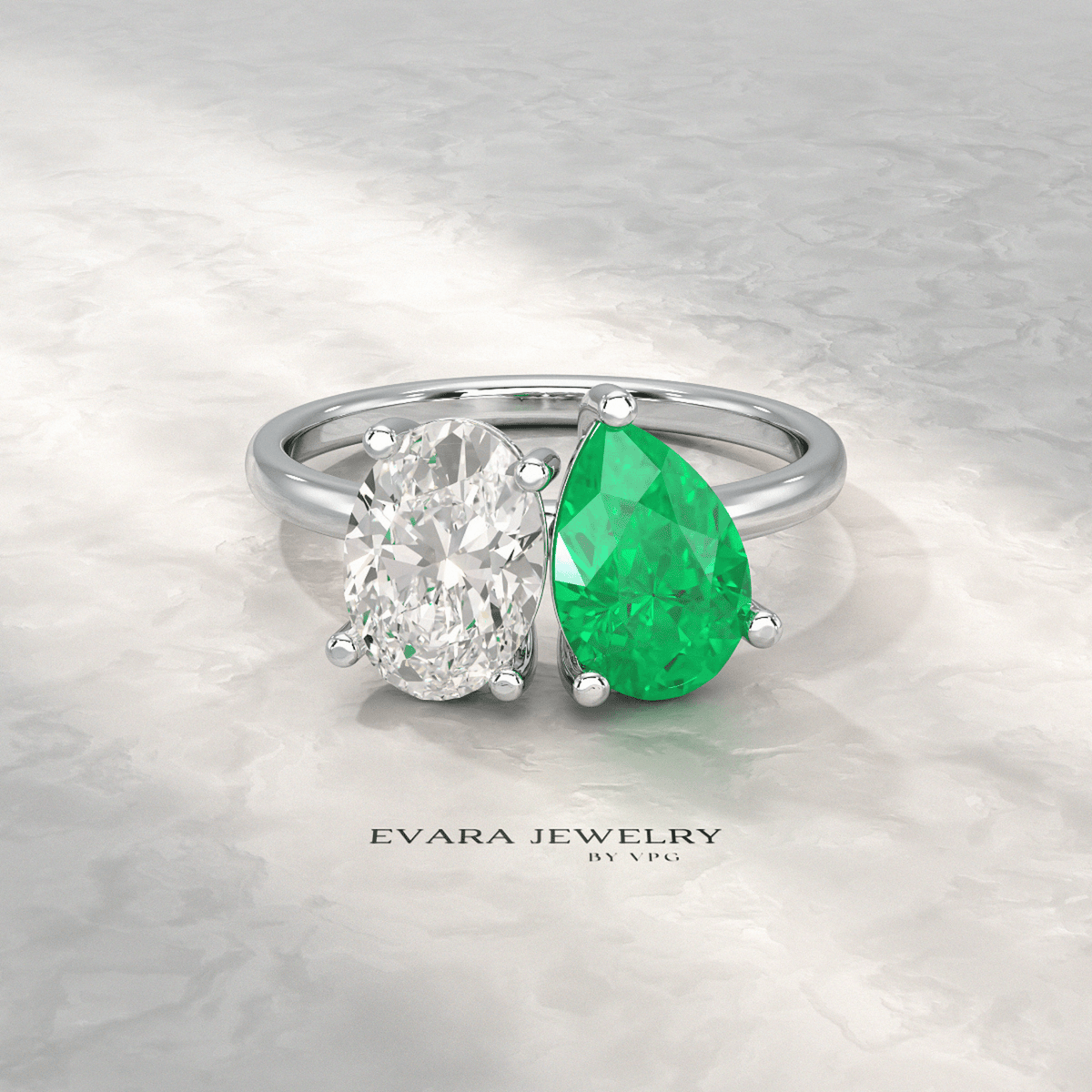 2.30 Carat Oval Cut Diamond & Pear Cut Emerald Toi Et Moi Two Stone Ring