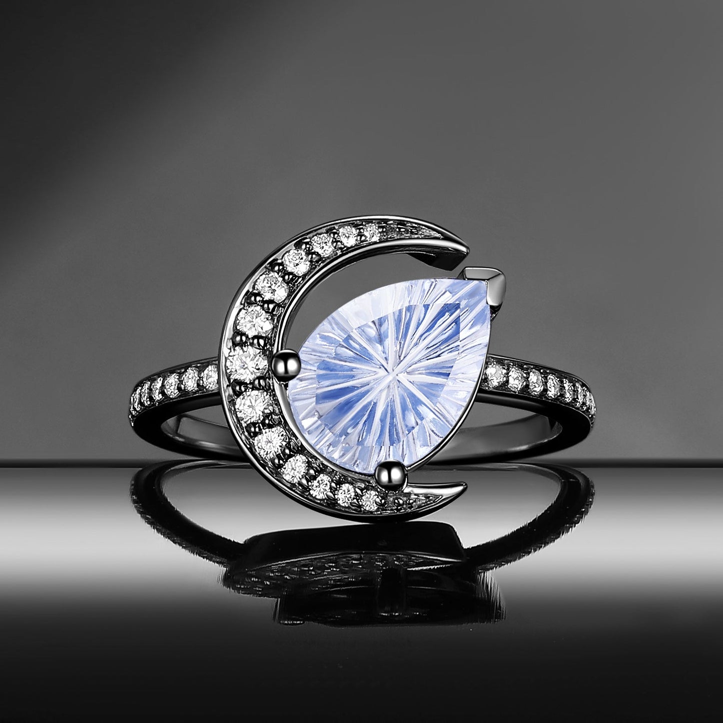 'Moonlit Reverie' - Fantasy Cut Pear Blue Sandstone Tilted Crescent Moon Engagement Ring