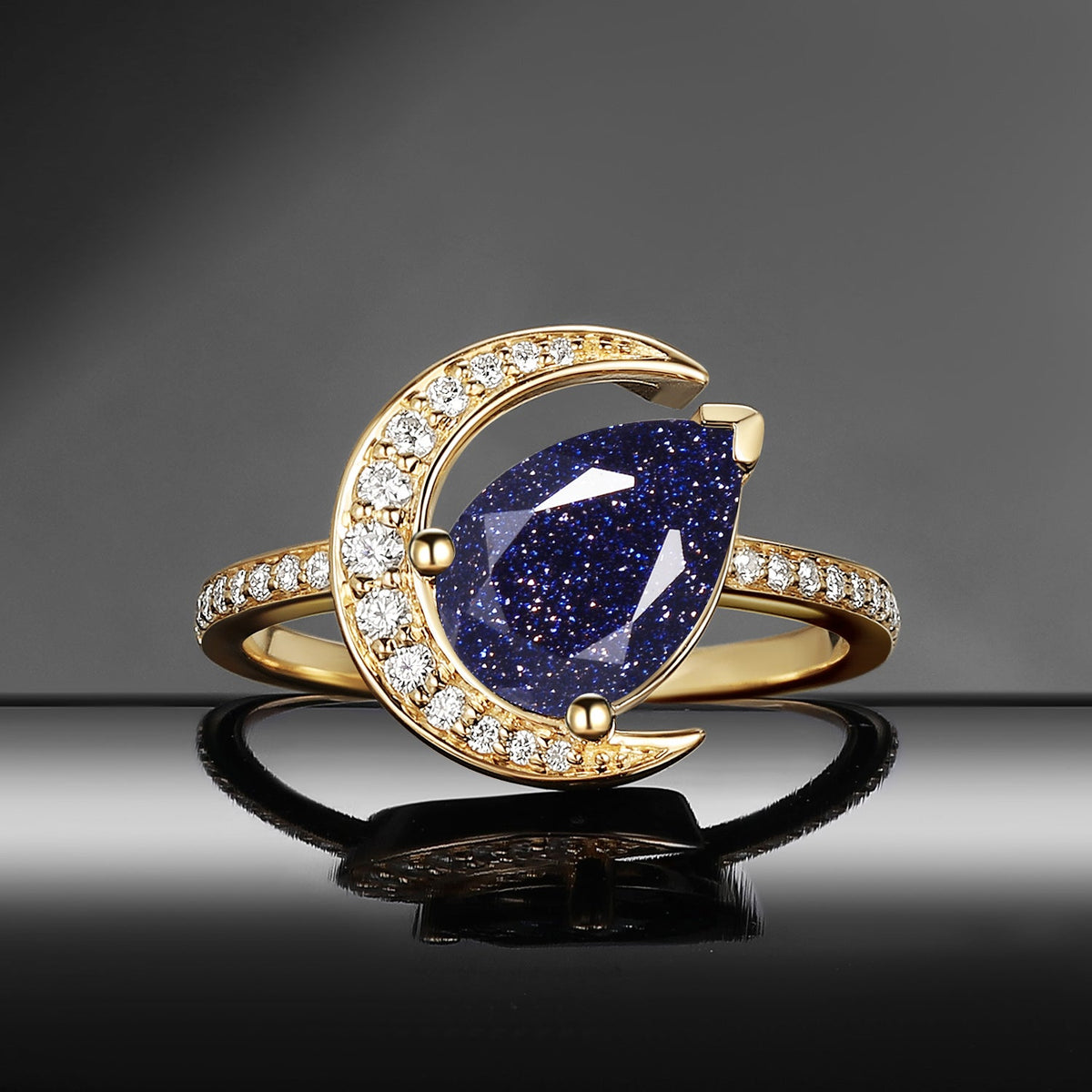 'Moonlit Reverie' - Tilted Pear Cut Blue Sandstone Crescent Moon Engagement Ring