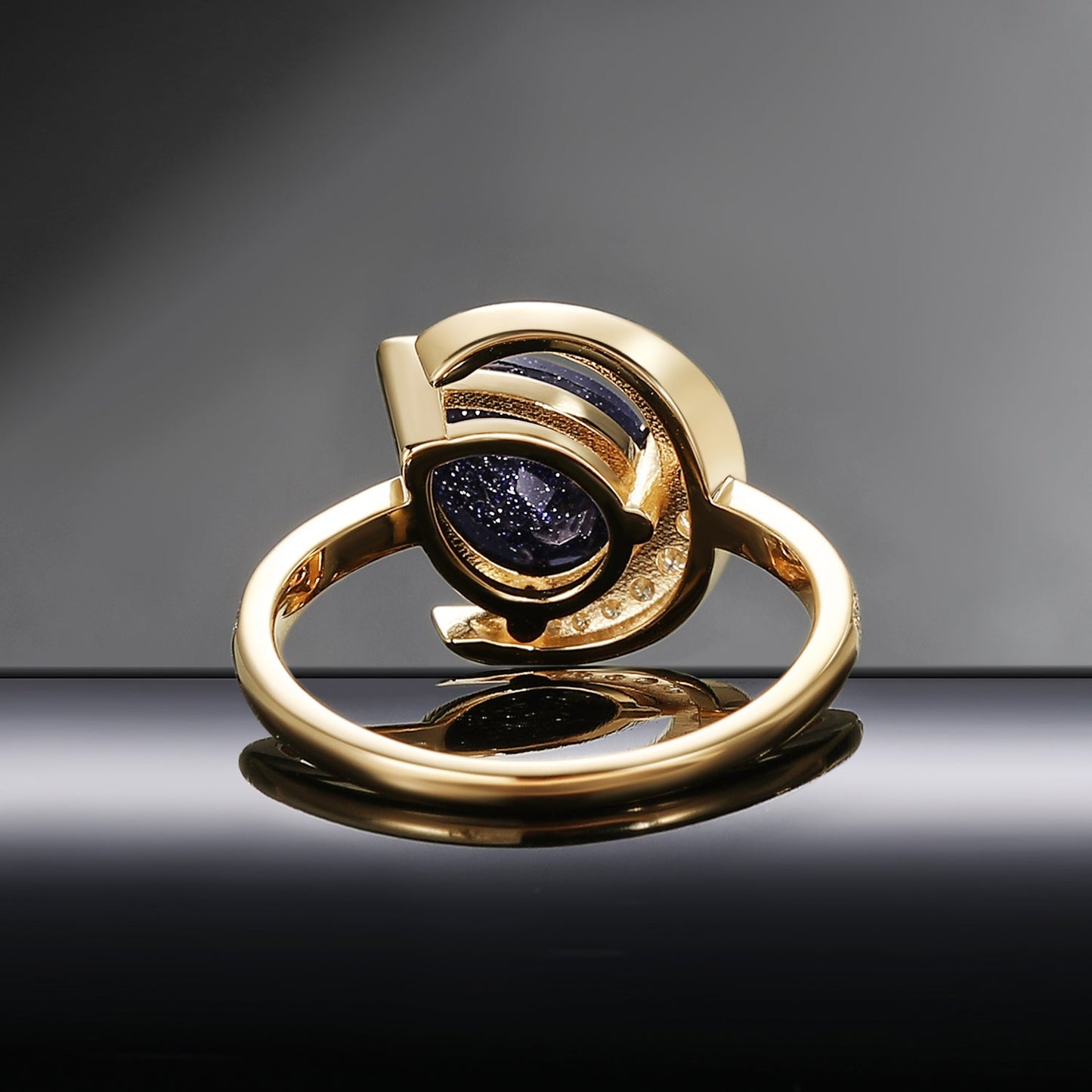 'Moonlit Reverie' - Tilted Pear Cut Blue Sandstone Crescent Moon Engagement Ring