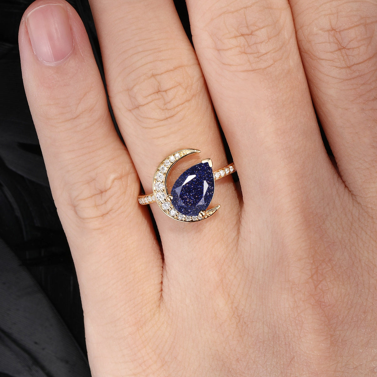 'Moonlit Reverie' - Tilted Pear Cut Blue Sandstone Crescent Moon Engagement Ring